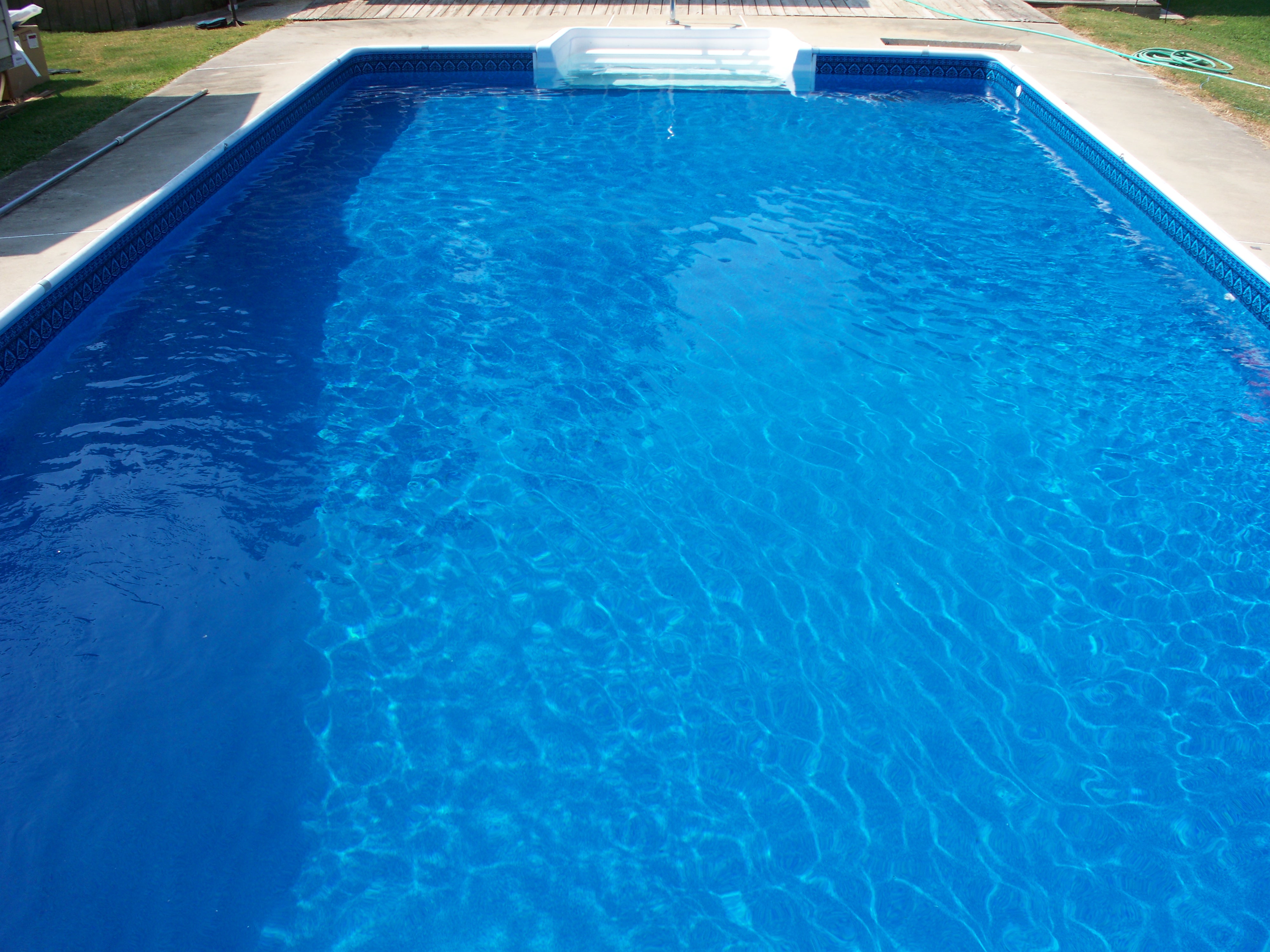 After: Lumpkin pool with bright new blue vinyl liner