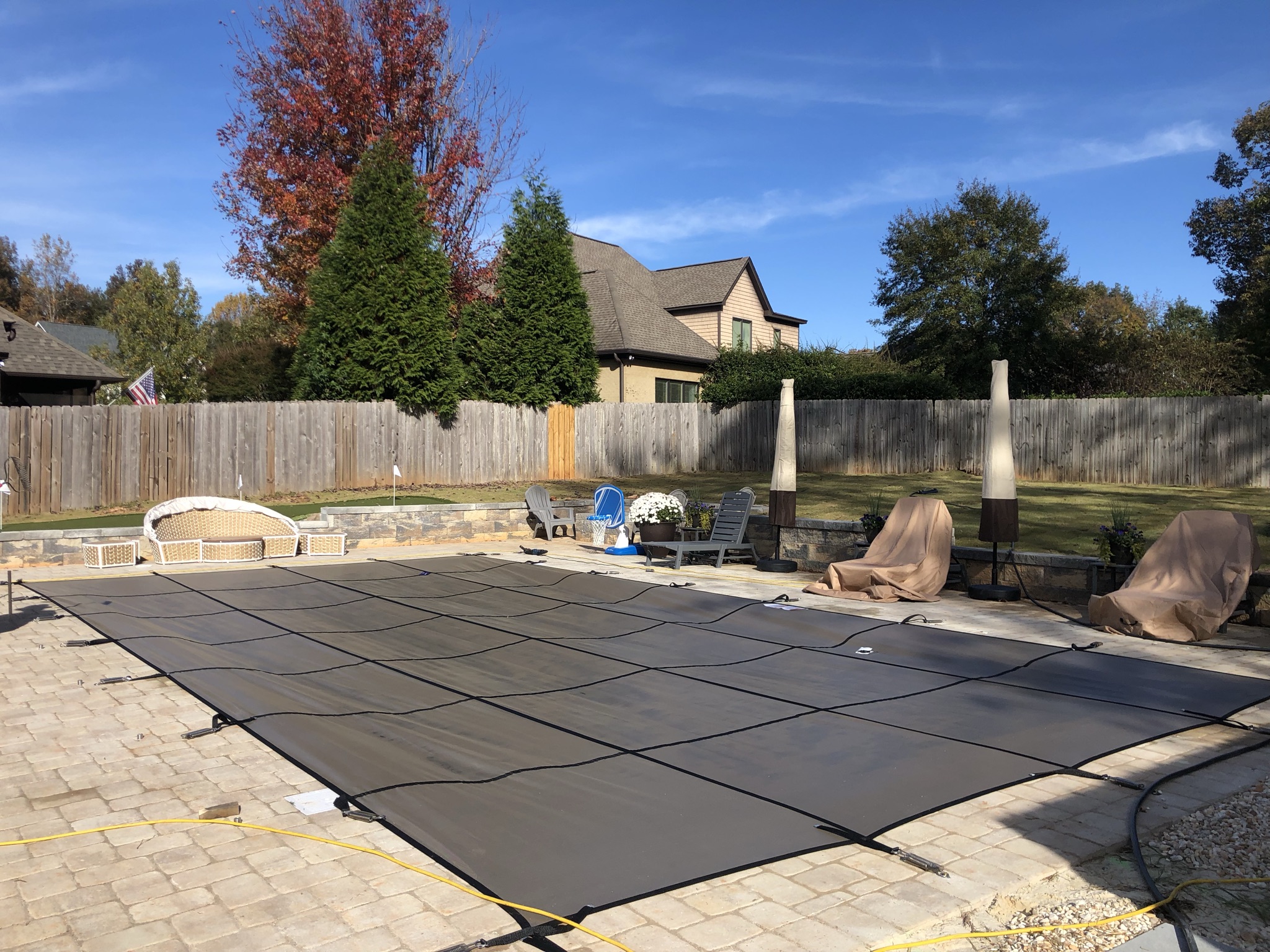 Pool safety cover installation at Echols property showing clean professional finish